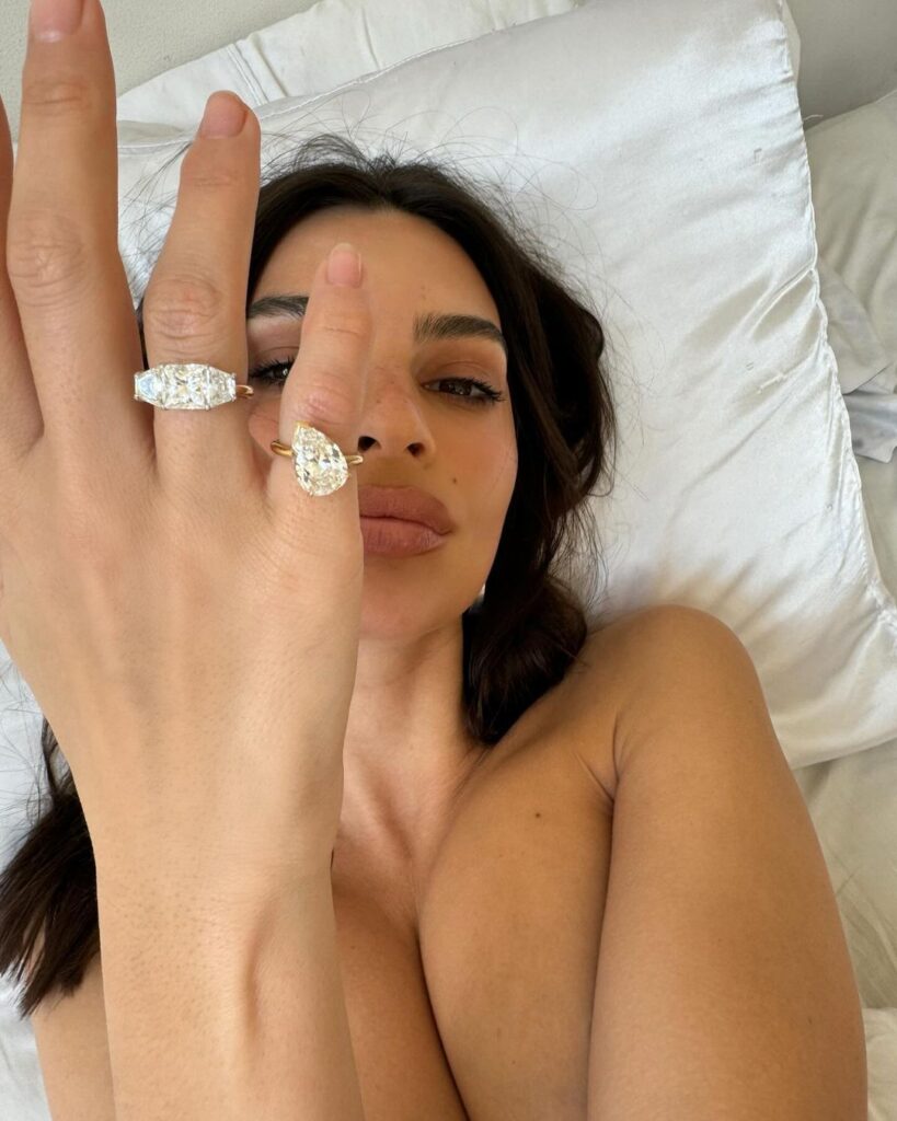 Emily Ratajkowski celebrates divorce with topless photos and redesigned engagement ring