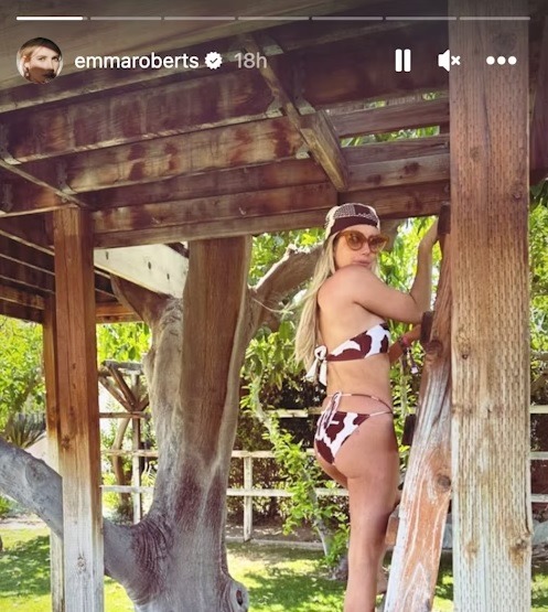 Emma Roberts' pool side glam in leopard print bikini