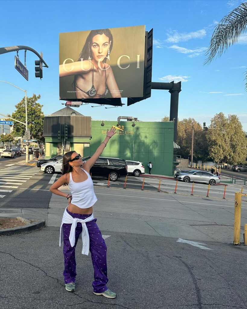 Prominent billboard featuring Vittoria Ceretti with Gucci