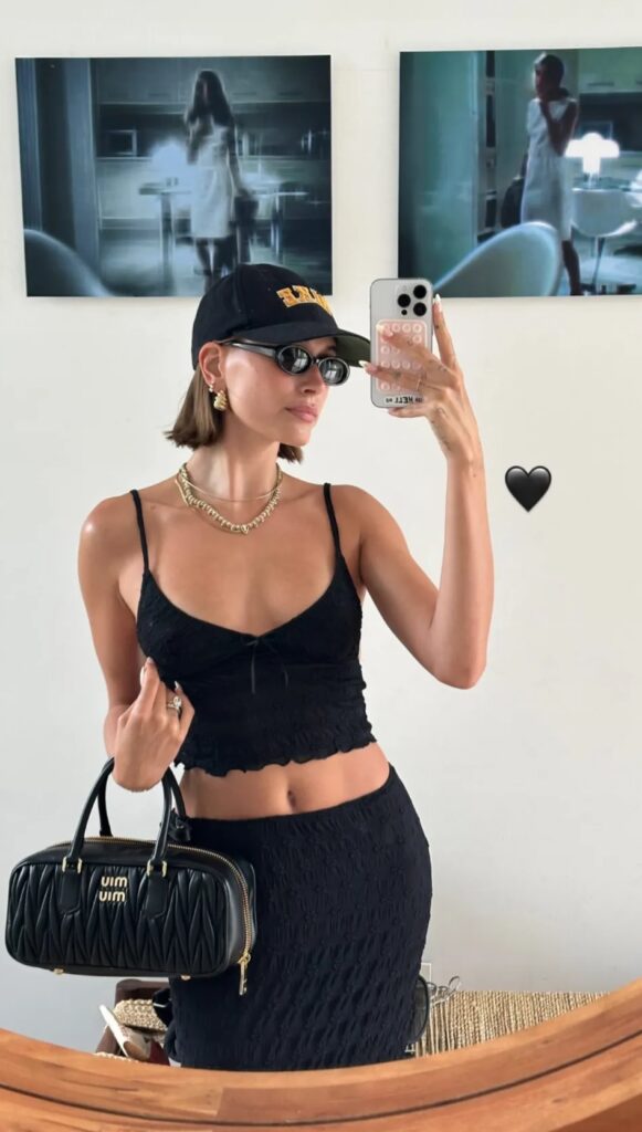 Braless and confident Hailey Bieber in this mirror selfie