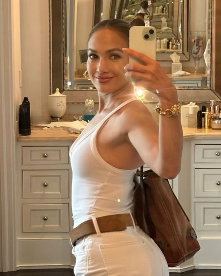 Jennifer Lopez sexy selfie in white tank top